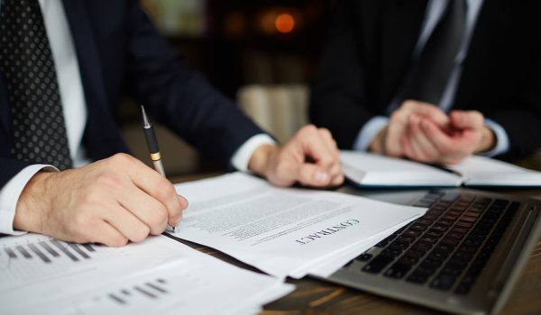 businessman reading contract closeup